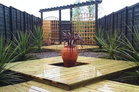 Structures can change the feel of a square garden design